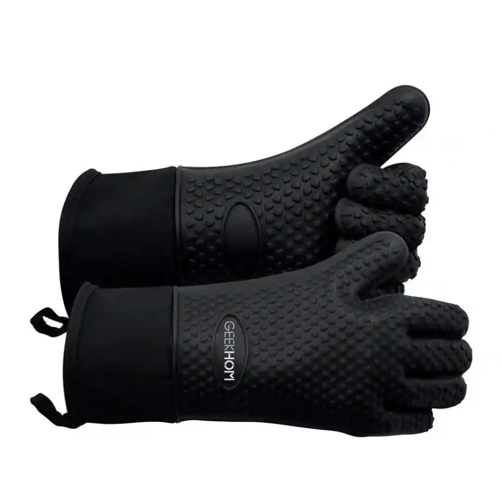 Heat-resistant gloves for handling hot tools and surfaces while cooking on Blackstone